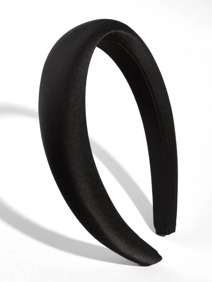 Our storm black padded headband shown against a white background at an angle. Highlighting the dark colour and sheen of the satin material. Perfect for bridal events or formal events.