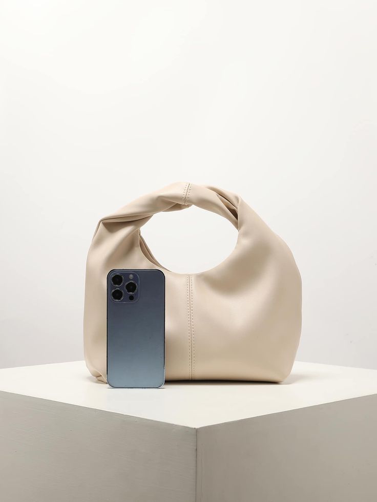 Bridal cream PU leather handbag with ruched detailing, perfect for weddings, hens parties, and special occasions.