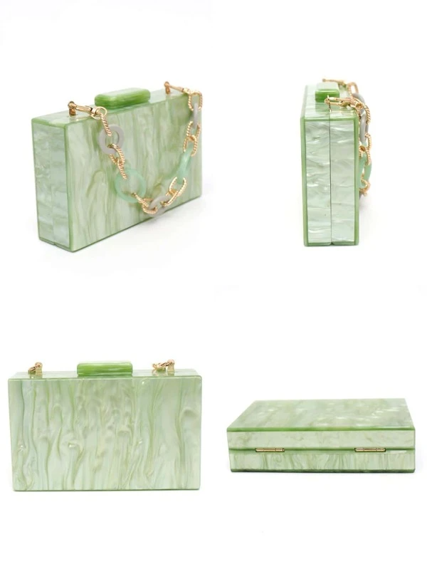 Our rectangular Mint acrylic resin clutch bag shown against a white background with a looped gold and acrylic circle detail handle. The circular loops are a mix of green and grey. Here all angles of the bag are shown, highlighting the soft green resin design and compact size. Perfect pop of colour to your outfit for your next evening event