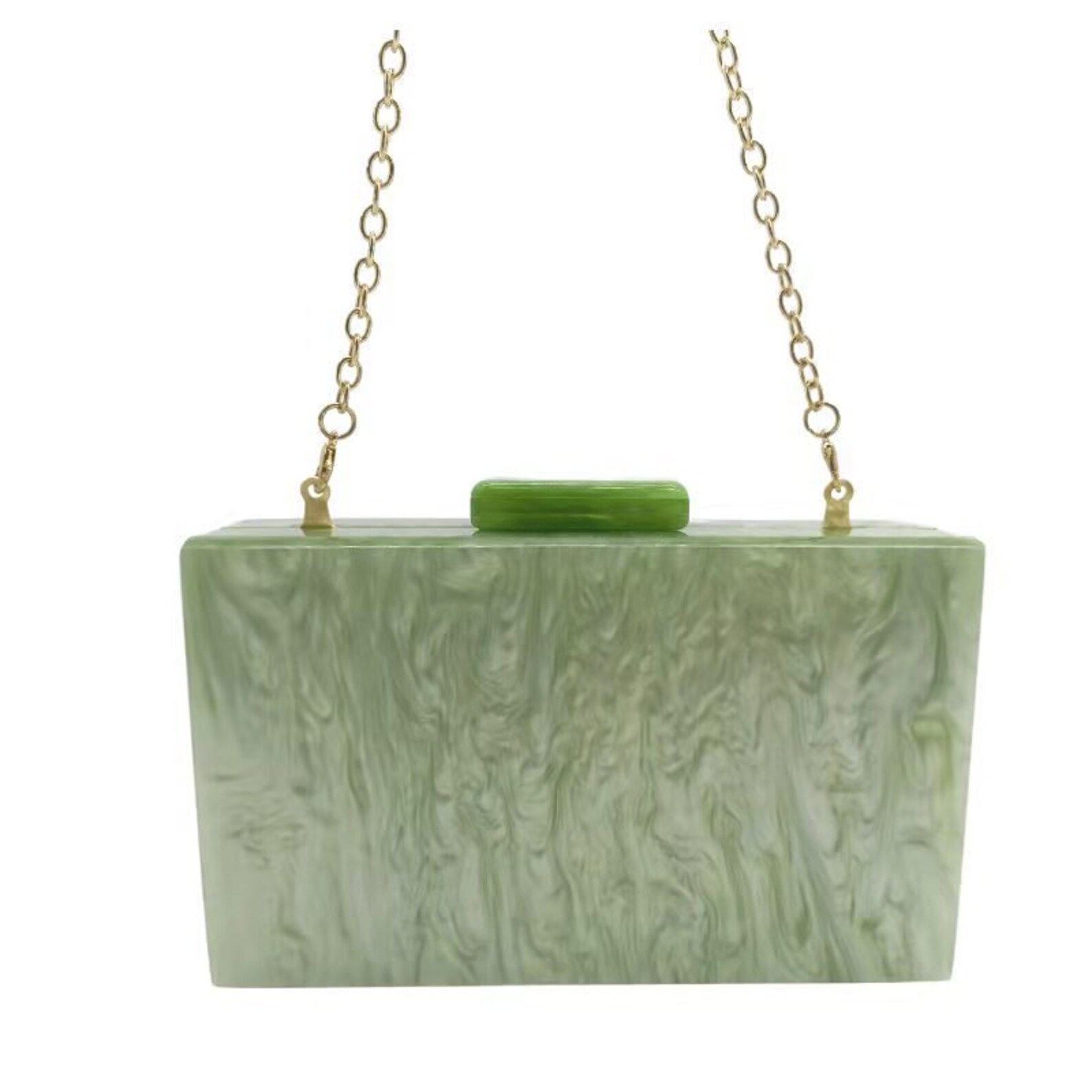 Our rectangular Mint acrylic resin clutch bag shown against a white background with a smaller gold chain handle attachment. Perfect pop of colour to your outfit for your next day to evening event